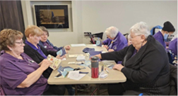 London Trefoil Guild writing thank you cards to Guiders for World Thinking Day.