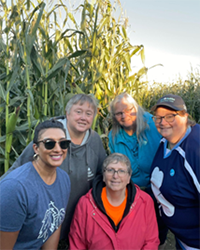 Five members of Wild Tumbleweends in the corn maze