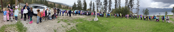 Lake Country Trefoil Guild at the Into the Forest event outside with a lot of girl members